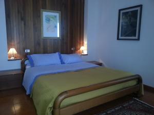 A bed or beds in a room at Villa Betta