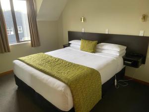 Postel nebo postele na pokoji v ubytování Allan Court Motel