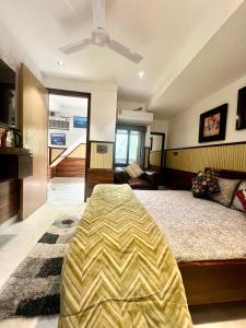 Postel nebo postele na pokoji v ubytování House Of Comfort Delhi