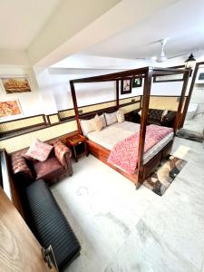 Postel nebo postele na pokoji v ubytování House Of Comfort Delhi