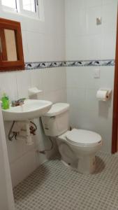 Koupelna v ubytování Orizaba Suites