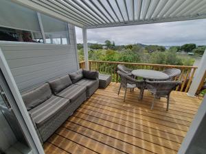 Balkón nebo terasa v ubytování Stanmore Bay Beach House