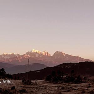 a view of a mountain range with snow capped mountains at everest view resort in Jantra Khāni