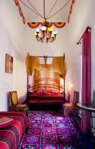 Postel nebo postele na pokoji v ubytování Riad Zara + 37 fotografií