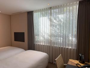 Telewizja i/lub zestaw kina domowego w obiekcie Acube Hotel Dongdaemun