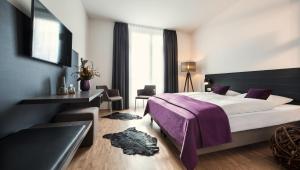 Postel nebo postele na pokoji v ubytování Hotel K99 + 19 fotografií