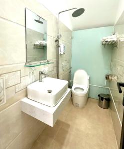 Koupelna v ubytování Hotel KAMI 1