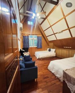 Postel nebo postele na pokoji v ubytování Haowangjiao Homestay