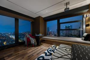 Voodi või voodid majutusasutuse Beso Designer Apartent Hotel toas