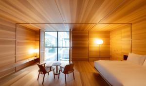 SHIROIYA HOTEL客房内的一张或多张床位