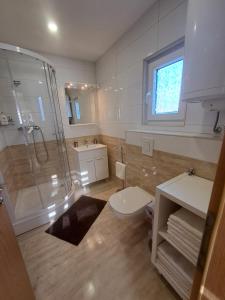 Et badeværelse på Apartma Anci