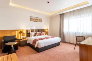 Mandala Norling Lords Prime Kathmandu客房内的一张或多张床位