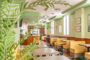 A restaurant or other place to eat at Hotel Ziò Imola