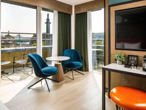 Televisor o centre d'entreteniment de ibis Styles Edinburgh St Andrew Square