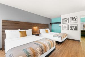 Voodi või voodid majutusasutuse Maverick Hotel Eugene Near University, Ascend Hotel Collection toas