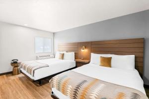 Voodi või voodid majutusasutuse Maverick Hotel Eugene Near University, Ascend Hotel Collection toas