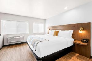 Voodi või voodid majutusasutuse Maverick Hotel Eugene Near University, Ascend Hotel Collection toas