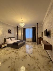 Postel nebo postele na pokoji v ubytování Mirvarim Hotel