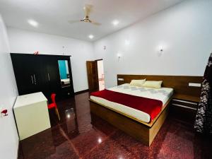 Voodi või voodid majutusasutuse Entire Private Luxury Resort in Wayanad - Cinnamon Villa Wayanad toas
