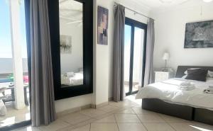 Postel nebo postele na pokoji v ubytování Villa Las Vistas Costa Adeje