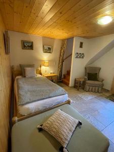 Voodi või voodid majutusasutuse Charmante maisonnette avec vue sur les montagnes toas