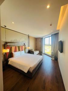 Gallery image of Apec Mandala Cham Bay Muine Condotel in Mui Ne