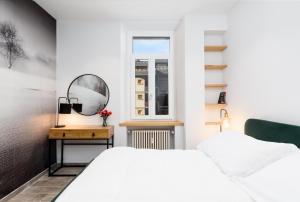Postel nebo postele na pokoji v ubytování Dolce Limone by Rentbeat