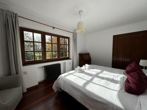 Ένα ή περισσότερα κρεβάτια σε δωμάτιο στο Casa Vaqueiro Llanes VV-1727-AS