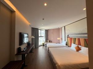 TV a/nebo společenská místnost v ubytování Apec Mandala Cham Bay Muine Condotel