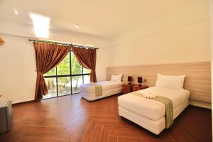 Postel nebo postele na pokoji v ubytování Dolphin Bay Island Resort 海豚岛