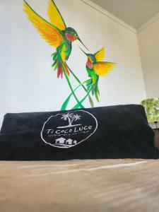 Certificato, attestato, insegna o altro documento esposto da Ti coco luce studio à Sainte Luce dans village de vacances