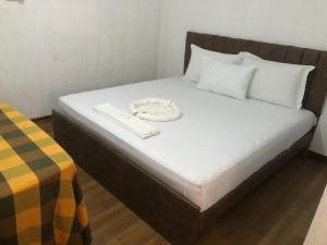 Postel nebo postele na pokoji v ubytování Hotel Parami