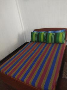 Postel nebo postele na pokoji v ubytování Hotel Parami