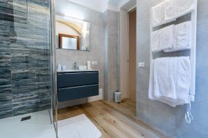 a bathroom with a shower and a sink at Al Merlo da Diego in Cagliari +33 photos