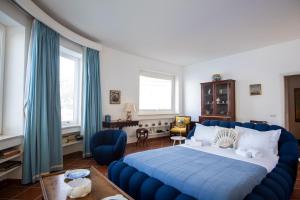 Ένα ή περισσότερα κρεβάτια σε δωμάτιο στο Villa Livia