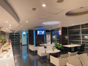 Studio One Thamrin Hotel TV 또는 엔터테인먼트 센터