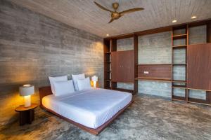 Postel nebo postele na pokoji v ubytování Villa, Vue Mer et Piscine Privée