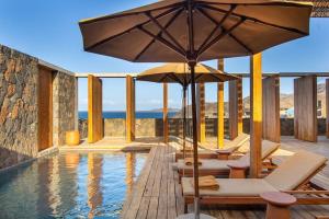 Bazén v ubytování Villa, Vue Mer et Piscine Privée nebo v jeho okolí