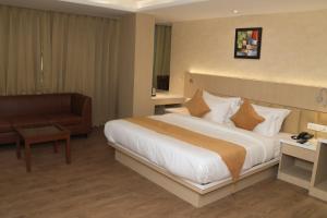 Krevet ili kreveti u jedinici u okviru objekta Hotel Radiance