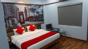 Annandam Inn(Hotel Anand)客房内的一张或多张床位