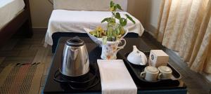 Tiện nghi pha trà/cà phê tại Namasthe Ayurveda and Yoga Retreat Cochin