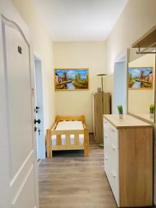Postel nebo postele na pokoji v ubytování Kael Apartment
