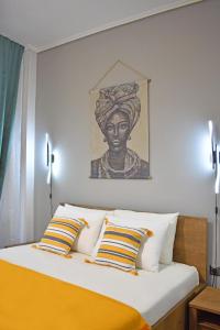 Postel nebo postele na pokoji v ubytování Maya Studio Piraeus + 14 fotografií