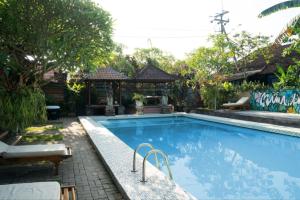 Bazén v ubytování Ubud Backpacker Hostel nebo v jeho okolí