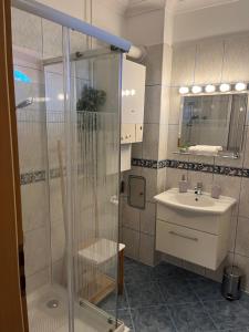 Kúpeľňa v ubytovaní Y Apartman