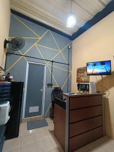 an office with a star painted on the wall at PTS Homestay Syariah in Bandung