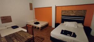Katil atau katil-katil dalam bilik di Mediterraneo Youth Hostel