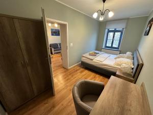 Postel nebo postele na pokoji v ubytování Apartament Kleopatra