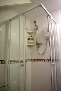 Ένα μπάνιο στο Harrington Guest House