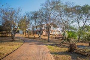 a brick path in front of a house at Ashburton Stays in Pietermaritzburg